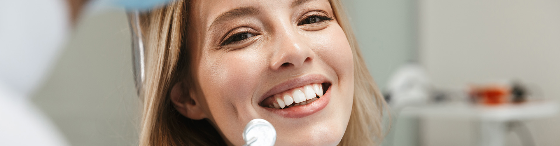 woman having her teeth cleaned